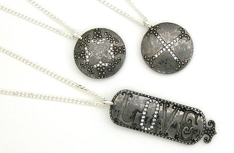 Mizuki pendants in blackened silver with diamonds