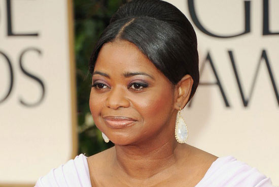 Octavia Spencer in spectacularly oversized rainbow moonstone earrings and rings by Irene Neuwirth