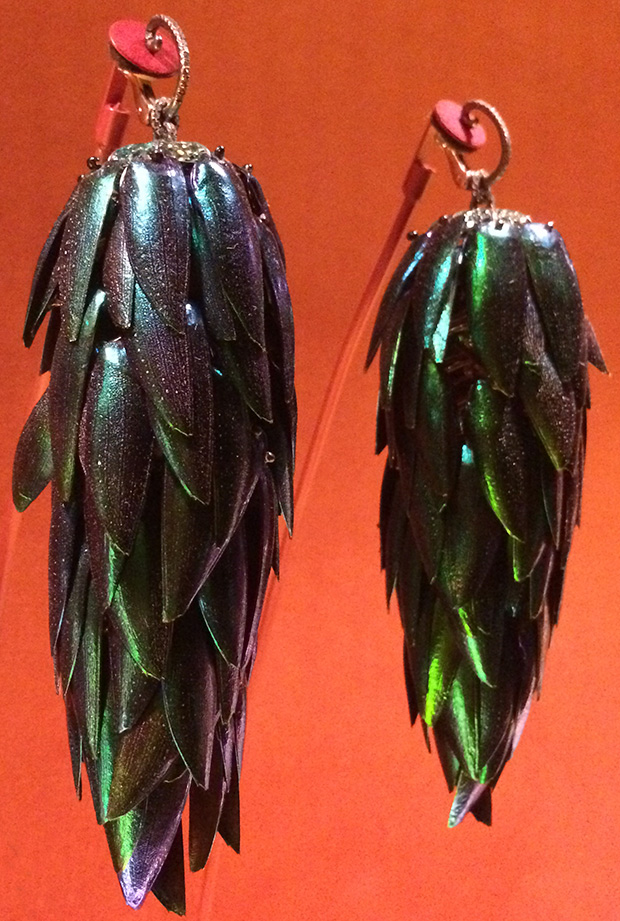 Earrings by JAR, beetle wings, emerald, tsavorite garnet, diamond, silver, platinum, 2011. Photo by Cheryl Kremkow.
