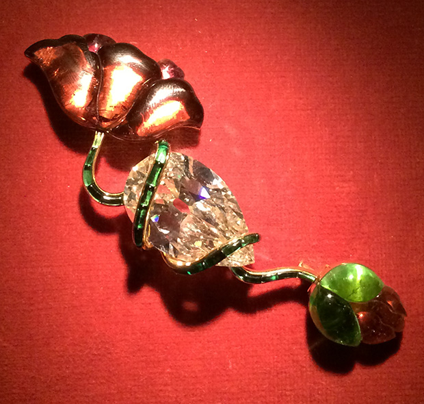 Poppy Brooch, diamond, tourmaline, and gold, 1982. Photo by Cheryl Kremkow.