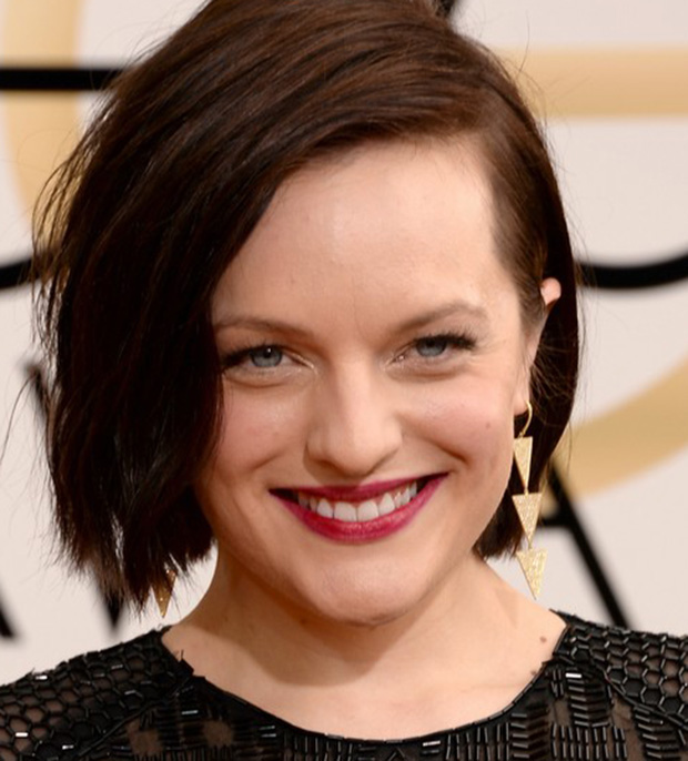 Elisabeth Moss wears Jennifer Meyer earrings at the 2014 Golden Globes