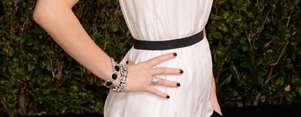 Jennifer Lawrence wears bracelets by Neil Lane to the 2014 Golden Globe Awards