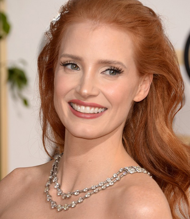 Jessica Chastain wears a diamond and platinum Bulgari necklace from the 1930s to the 2014 Golden Globes