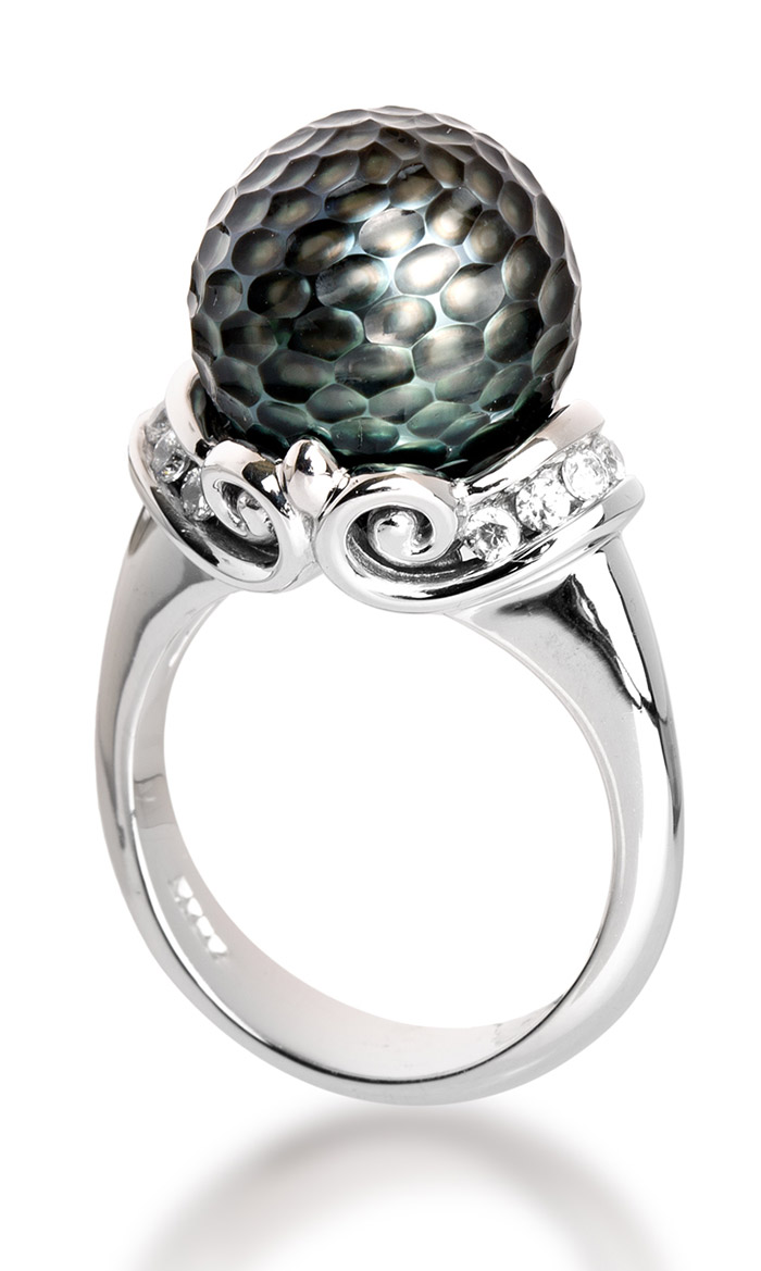 This carved Tahitian Pearl Ring from the Momento Collection by Galatea contains an NFC chip that allows it to save an play back voice, images, and videos with a tap to your phone.