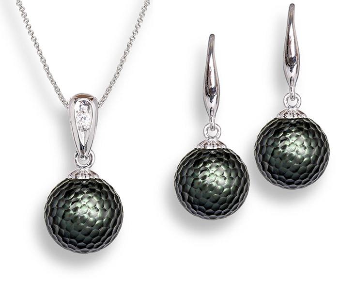 These carved Tahitian pearl earrings and pendant from the Momento Collection by Galatea contains an NFC chip that allows it to save an play back voice, images, and videos with a tap to your phone.