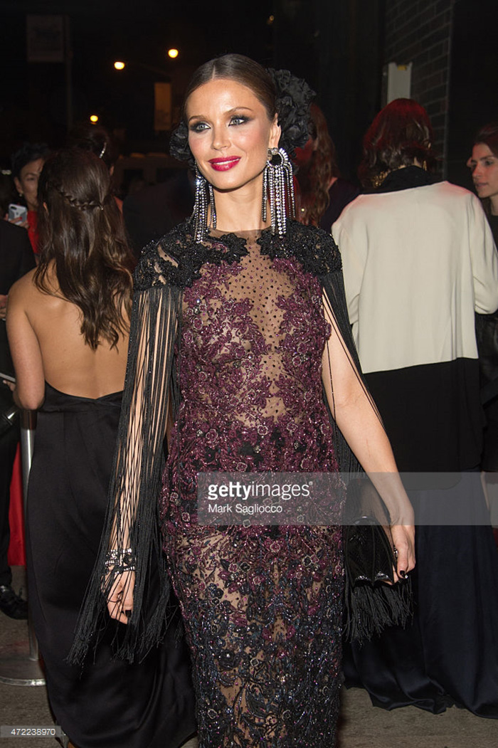 Georgina Chapman wears fringe earrings to the 2015 Met gala