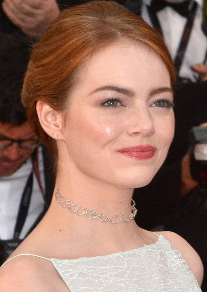 Emma Stone wears a Repossi choker at the 2015 Cannes film festival.