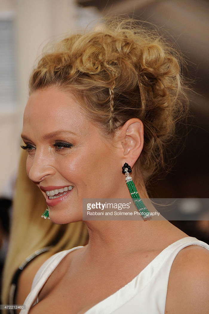 Uma Thurman wears tassel earrings to the 2015 Met Gala. Photo