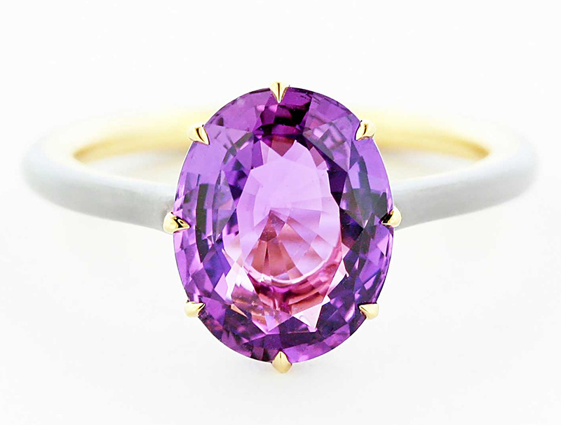 A purple sapphire on a white ceramic band by James de Givenchy for Taffin