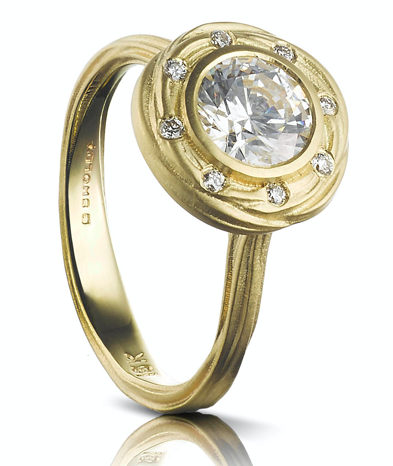 Wide bezel engagement ring by Sholdt