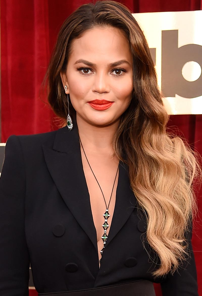 Chrissy Teigen in my favorite necklace of the night: enamel and emeralds by Nikos Koulis.  (And that earring!)