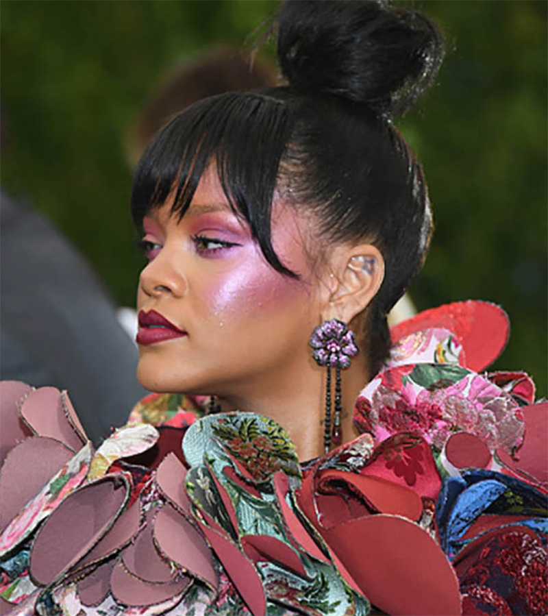 Rihanna wears earrings from the Rihanna Loves Chopard collection to the 2107 Met Gala