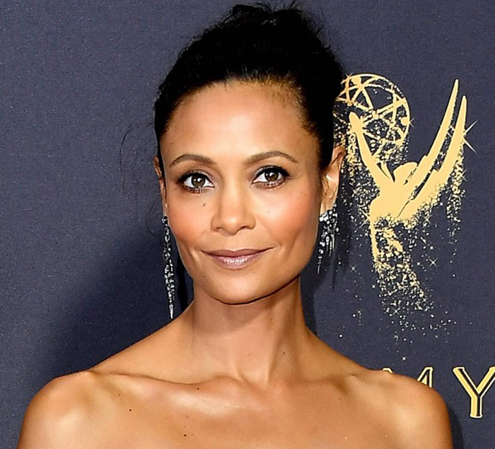 Thandie Newton in mismatched earrings by Fred Leighton